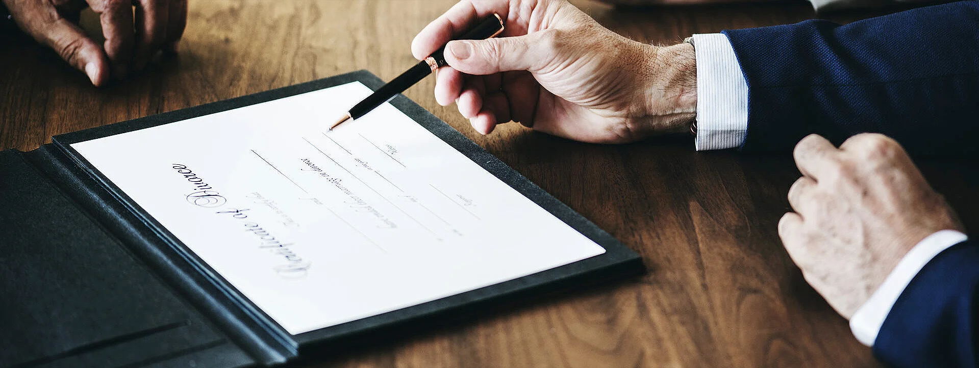 A man signing notary paper